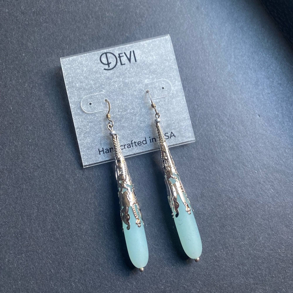 Devi silver toned tear drop earrings in pale blue for pierced ears